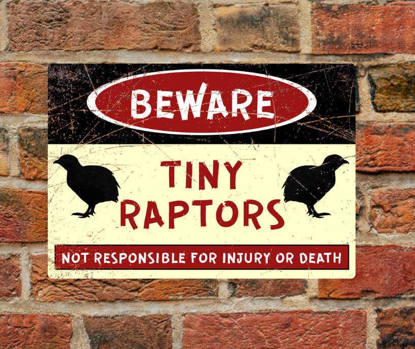 Beware - Tiny Raptors - Just quail - A4 Aluminium sign mounted on brick wall. Features bold warning text with quail silhouettes for safety alerts.