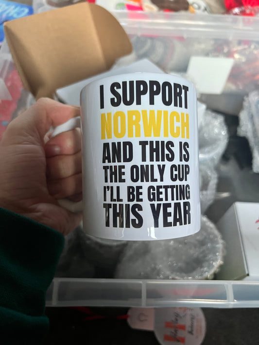 I Support Norwich - Norwich funny football fan mug in white ceramic, 11oz size, with humorous text for football lovers and gift ideas.
